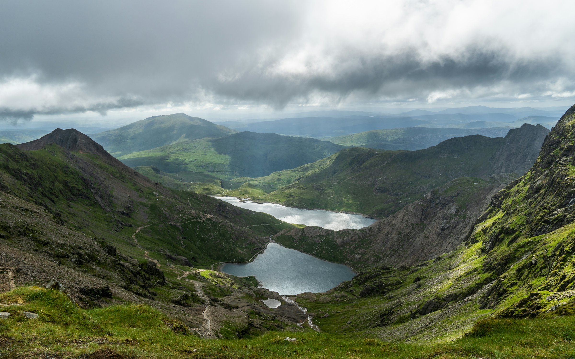 Mountain lakes and cloud-lit ridgelines in Snowdonia, Wales